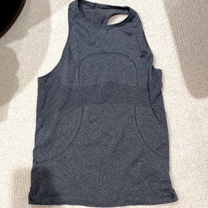 Lulu lemon racer back tank. Dark gray size 6 or 8. More fitted style